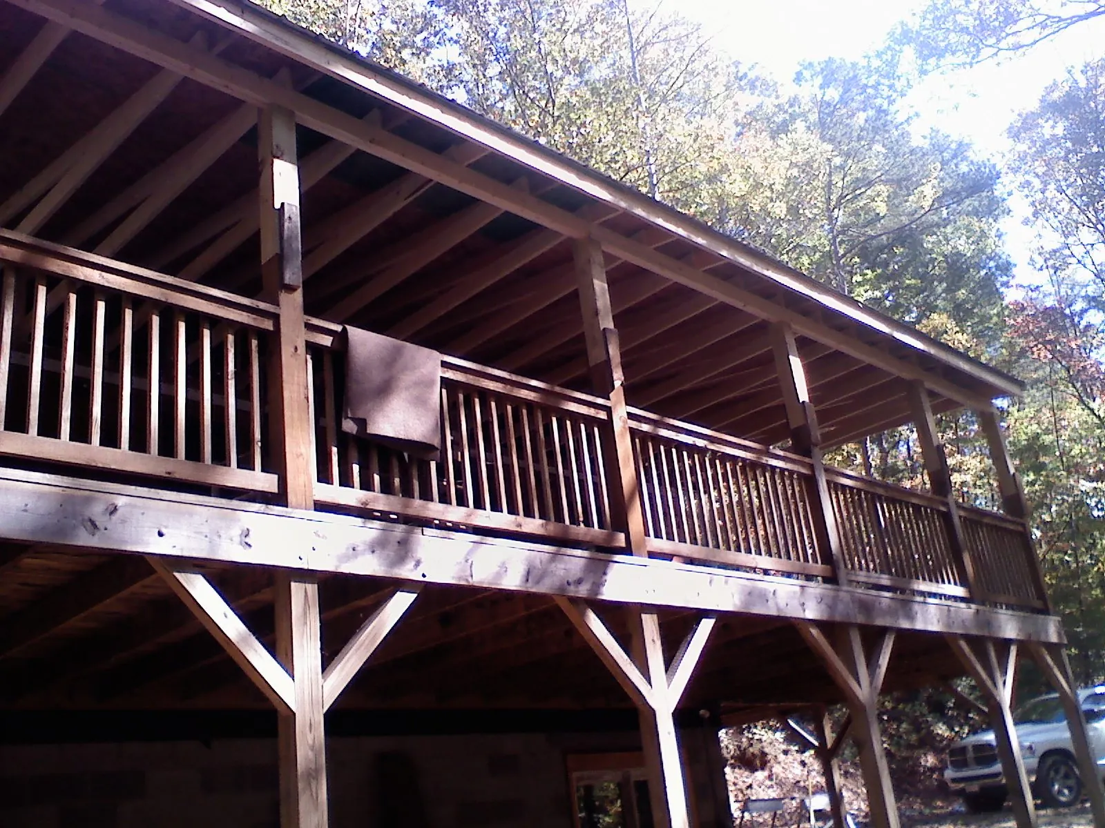 Timber framing under a new elevated porch and deck — Roof Leak Repair in Asheboro by Roofing Brothers